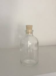 115 miniature glass bottles with cork