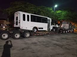 lowboy trailer transport
