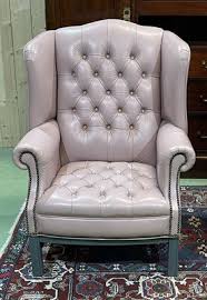 chesterfield chairs in pale pink