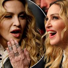 He was 32 as she approached 50. Madonna S Wrinkled Hands Give Away Her Real Age As She Attends Ufc 205 Daily Record