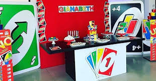 Uno is a card game developed by merle robbins in 1971. Here S A Wide Shot Of The Bold Colorful Set Up Inspired By The Uno Game For A F Birthday Party Theme Decorations Colorful Birthday Party Game Night Decorations