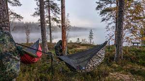 Ended up with a round od green parachute canopy (no harness or lines). Spending A Night In A Hammock In Every Season Finland Naturally