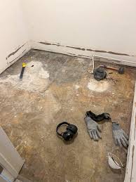 remove floor tile in your bathroom