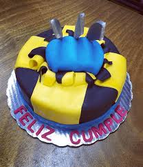 Then, put a thick layer of frosting on your cake as a base, making it as smooth as possible. X Men Cake Design Images X Men Birthday Cake Ideas