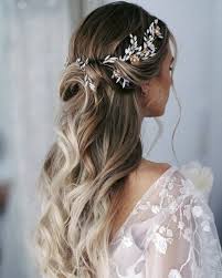 Secure these braids with invisible hair pins. 71 Perfect Half Up Half Down Wedding Hairstyles Wedding Forward