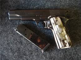 15 rounds in a magazine is great, but 27 rounds? Charles Daly 1911 45 Acp Semi Auto Pistol 8 Rds 5 Barrel W Custom Grips Semi Auto Pistols At Gunbroker Com 884896285