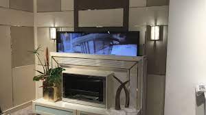 tv lift cabinets that disguise your