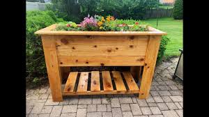 I figure its probably not a good idea for me to i will add compost and topsoil to the inside of the box but below is clay dirt. Diy Large Cedar Raised Planter Box With Drainage For 50 Youtube