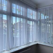 difference between net curtains and voiles