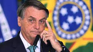 The conservative president waved to the crowd from his motorcycle and later from atop a sound truck, where helmeted but largely maskless backers cheered and chanted as he. Bolsonaro Booed On Plane Tells Critics To Take A Donkey Rfi