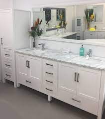 A double trough sink bathroom vanity has basins recessed directly into its countertop, making it an easy clean option. Palmera 90 Inch Double Sink Bathroom White Vanity Side Cabinet Tower