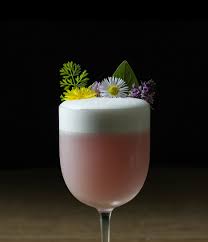 A tiki drink is a category of cocktails that are often made with rum and are usually colorful, fruity, and lavishly garnished. The Cocktailian S Guide To Edible Flowers Moody Mixologist