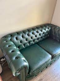 english green chesterfield sofa