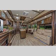 This coach has a master suite with king size bed, second bedroom/office for guests or work, and plenty of kitchen/living room space to have company or lounge. Grand Design Solitude Review The Big Tall Of The Fifth Wheel World Windish Rv Blog