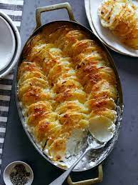 potatoes au gratin spoon fork bacon