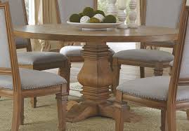 Tabletop with a touch of wood grain detail makes the most of wood's natural variation. Florence Round Pedestal Dining Table Rustic Smoke Coaster