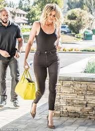 Here, khloe is sporting a red jacket with black yoga pants. Khloe Kardashian Look Kardashian Outfit Khloe Kardashian Style Kardashian Style