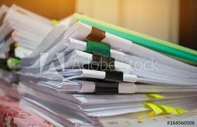 Paper Stack Pile Of Unfinished Documents On Office Desk