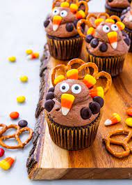 Just frost your favorite cupcake with chocolate frosting, really layering on the frosting so it makes a substantial mound. 20 Easy Thanksgiving Cupcake Recipes Cupcake Ideas For Thanksgiving