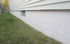 House Foundation With Faux Stone Panels