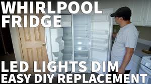 whirlpool refrigerator lights dim or