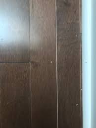 new wood floors have nail holes normal