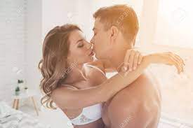Close Up Portrait Of Horny, Obsessed Couple, Hugging, Kissing With Close  Eyes Before Having Sex In The Perfect Morning Фотография, картинки,  изображения и сток-фотография без роялти. Image 98011657