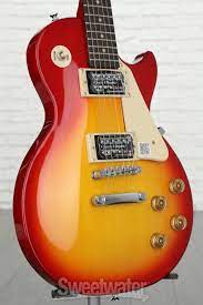 It's no way like the expensive one, but it reflects it in many ways, like the sound quality. Epiphone Les Paul 100 Heritage Cherry Sunburst Sweetwater