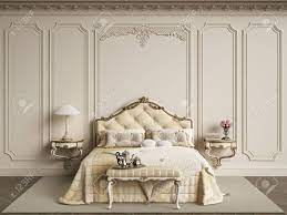 A classic style double bed, which can be forged, made of soft wood; Classic Bedroom Furniture In Classic Interior Walls With Mouldings Ornated Stock Photo Picture And Royalty Free Image Image 99350820