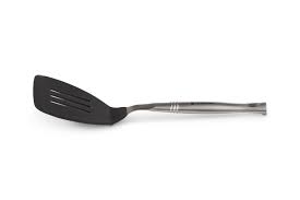 This includes a couple of different spatulas, large and solid spoons, and a pasta server. Stainless Steel Non Stick Slotted Turner Le Creuset Au