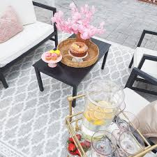 clean and wash an outdoor area rugs