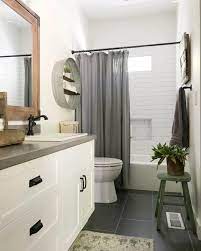 26 dark tile floor bathroom ideas that