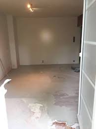 how to remove cement from wooden floor