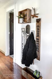 Compact Old Signs And Crate Coat Hook Area