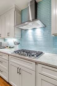 The Reflective Quality Of This Kitchens Blue Glass Tile