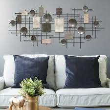 In addition to giving the sofa something to pop off of, the clock highlights the wall while filling the room with personality. Grey Wall Accents You Ll Love In 2021 Wayfair