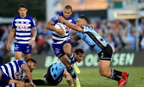 Emotions run high as bulldogs put bite on sharks to snare first win. Moses Mbye Valentine Holmes Moses Mbye And Valentine Holmes Photos Zimbio