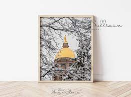snowy golden dome university of notre