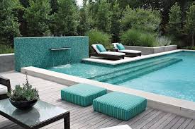 Typically, they send water cascading from above and flowing down the wall. Swimming Pool Tiles Landscaping Network