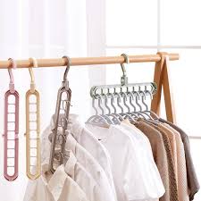 Fortunately there are lots of great diy scarf storage ideas out there to help you corral your scarves and keep them organized! Clothes Hanger Closet Organizer Space Saving Hanger Multi Port Clothing Rack Plastic Scarf Storage Hangers For Clothes Moon Ray Shop