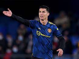 Manchester united got off to a winning start under michael carrick with cristiano ronaldo and jadon sancho scoring inside the final 12 . Kgddygtetzed M