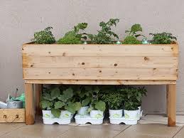 How to build a diy raised planter box with hidden drainage system. How To Build An Elevated Wooden Planter Box Diy