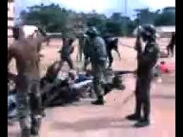 Image result for Nigeria Soldier beating people