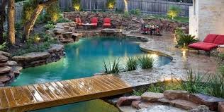 Splashy Pool Features Turn Backyards