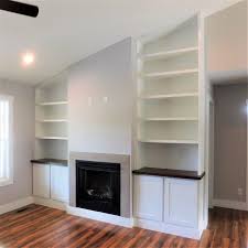 built in shelving around fireplace