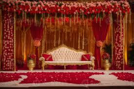 a red and gold wedding se with a