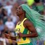 Shelly-Ann Fraser-Pryce fixes wig mid-race but still qualifies in