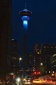 calgary tower lights up teal for pmdd