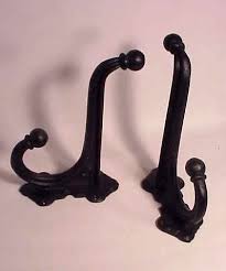 Pair Of Antique Cast Iron Wall Hooks