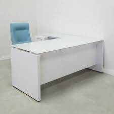 This white corner desk is conveniently compact, with an open lower shelf to hold storage boxes or a cpu. Denver Glass Top L Shape Desk